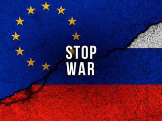 STOP WAR text. EU and Russian flags background. European union sanctions against Russia concept