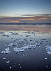 Foamy Beach at Sunset