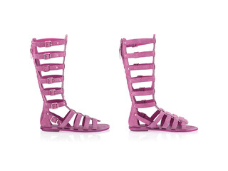 Pair of female pink leather boots isolated