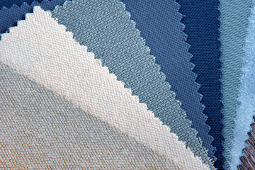 close up of the  grey blue  upholstery fabric texture and color choice for interior