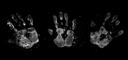 Set hand print with cocaine powder isolated on black