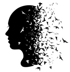 Silhouette of a girl with flying dove