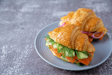 Smoked salmon ricotta cheese cucumber avocado croissant