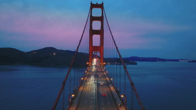 Aerial Golden Gate Bridge at night, Inspirational drone flight through red tower