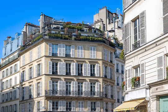 Paris, luxury parisian facade rue de Fleurus in the 6e arrondissement, with terraces on the rooftop
