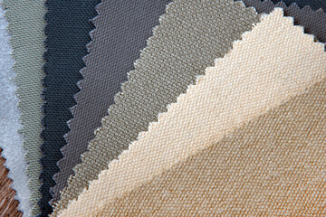 close up of the beige  grey  upholstery fabric texture and color choice for interior