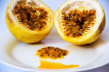 Passion fruit slightly wrinkled, split in half