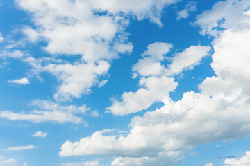 Clouds and blue sky. Cirrus and cumulus clouds on blue sky background.