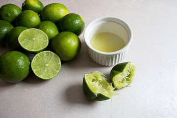 Several whole lemons and two split fruits