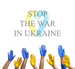 Hands painted in colors of Ukrainian flag on white background. STOP THE WAR IN UKRAINE