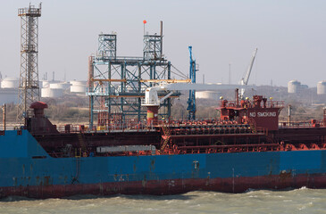 Fawley, Southampton, England, UK. 2022. Chemical oil products tanker ship discharging cargo at Fawley oil refinery on Southampton Water, UK.