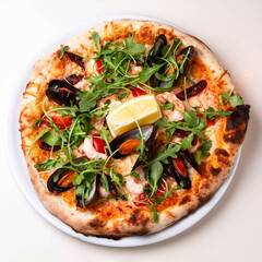 delicious italian pizza with fresh seafood isolated on white background
