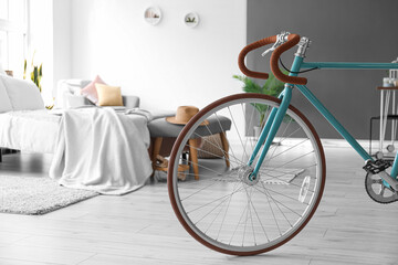 Interior of modern stylish bedroom with bicycle