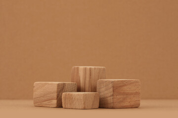 Wooden eco rustic platform podium on beige horizontal background. Minimal empty display product...