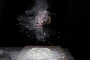 woman hands with flour, clapping