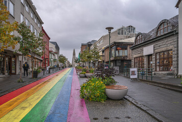 Rainbow painted street in downtown Reykjavik, Iceland - obrazy, fototapety, plakaty
