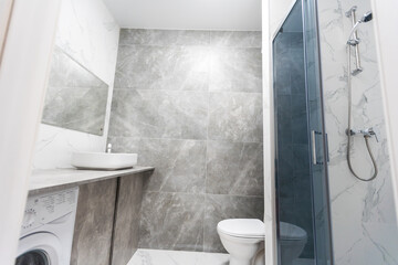 Modern Nordic Scandinavian interior design concept. Bathroom with neutral grey and beige colors....