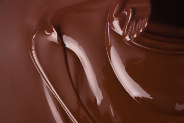 pour hot chocolate, sweet dessert. liquid chocolate background
