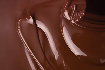 Foto auf Alu-Dibond pour hot chocolate, sweet dessert. liquid chocolate background © dmitr1ch