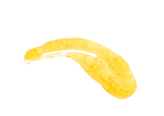 Smear of delicious orange jam on white background