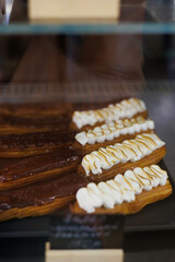 chocolate cakes on vitreen of coffee shop