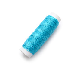 Bright thread spool on white background