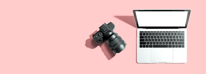 Laptop computer with a SLR camera from above