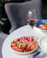 traditional wine appetizers. white and red wine. restaurant serving. summer mood. shallow depth of field
