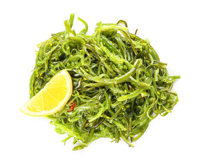 Healthy seaweed salad on white background
