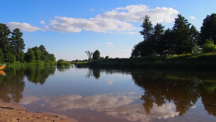 Fototapeta na wymiar calm summer landscape with standing river