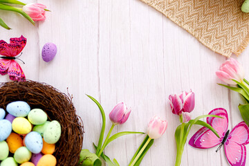 Top view and flat lay of conceptual arrangement decoration for Happy Easter holiday on wood background