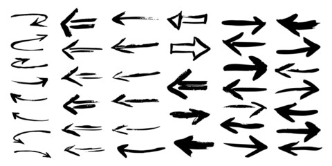 Black grunge arrows isolated on white background. Hand drawn vector illustration.