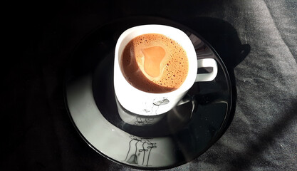 Coffee with milk black pla - obrazy, fototapety, plakaty