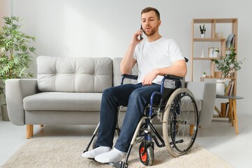 Young handsome man in wheelchair