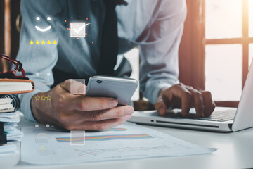 Fototapeta premium Customer review satisfaction feedback survey concept, User gives rating to service experience on online application, Customer can evaluate quality of service leading to reputation ranking of business.