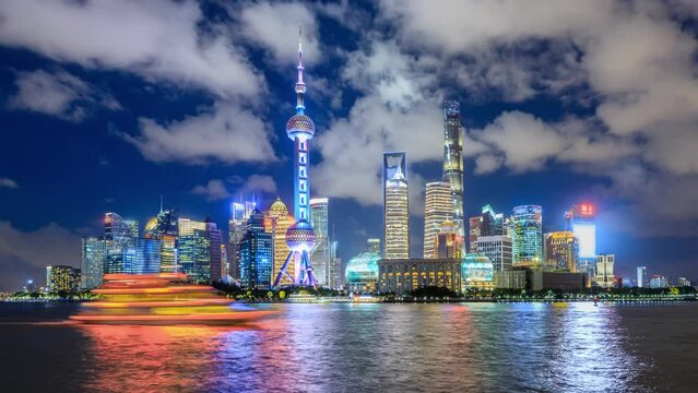 Shanghai city skyline and modern buildings at night, China. Famous Shanghai landmarks. 4K Time lapse.