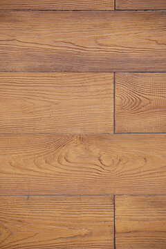 Closeup ahot of a Wooden floor made of parquet with a pattern