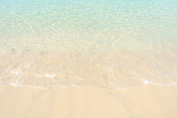 Beautiful beach and small waves .