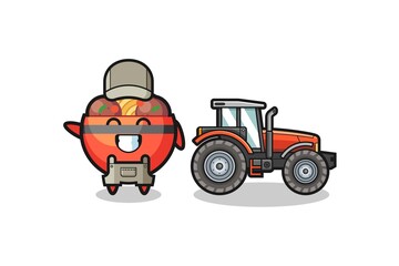 the meatball bowl farmer mascot standing beside a tractor
