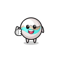 marble toy mascot doing thumbs up gesture