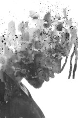 Paintography. A profile portrait of a man combined with various ink splashes.