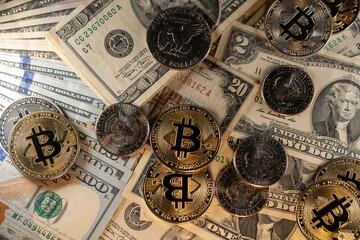 Bitcoin on half Dollar coins and USD Banknotes. Cryptocurrency trading with USD