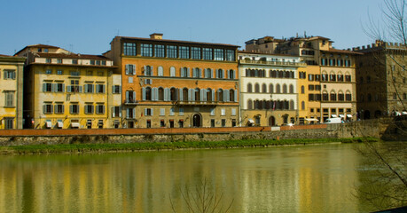 houses and buildings on the river arno