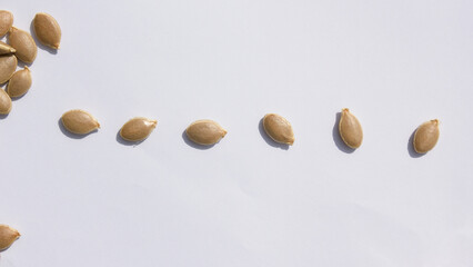 close up Sweet pumpkin seeds isolated white background.
