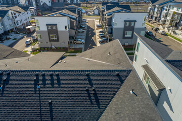 Fototapeta premium Rooftop of a new modern housing development.