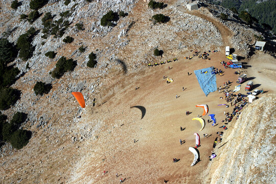 Paraglider fly from Mount Babadag top in Fethiye, Turkey. Mount Babadag near Fethiye and a famous paragliding area in Turkey.
