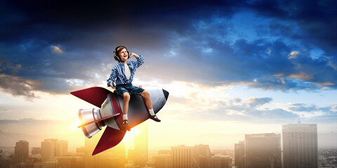 Kid wearing headphones on a rocket . Mixed media