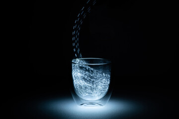 In the image can see a lantern light inside of a glass. This looks like an aura.