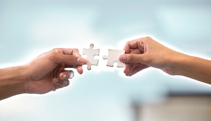 I bring the idea, she executes it. Cropped shot of two unrecognizable businesspeople holding up two...