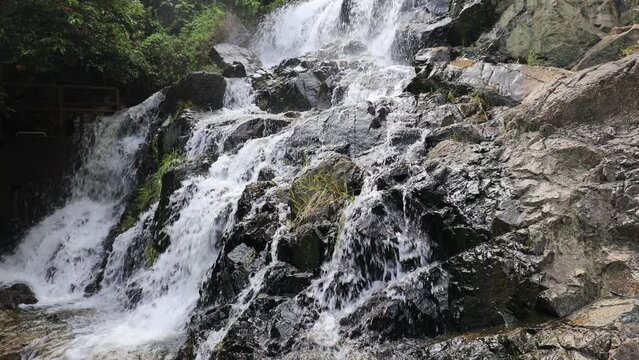 water flow at the main fall of the Silvermine Waterfalls on the Lantau